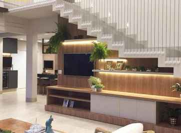 Tủ tivi dưới gầm cầu thang là gì? Những mẫu tủ tivi đẹp, độc đáo